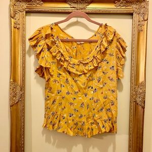 mustard blouse with ruffles and floral print
